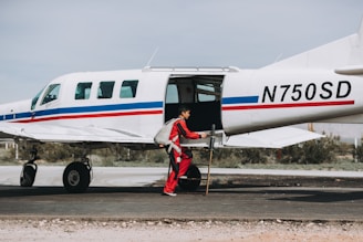 Safety technician inspecting avionics equipment for compliance.