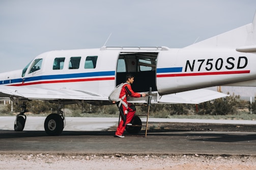 Safety technician inspecting avionics equipment for compliance.