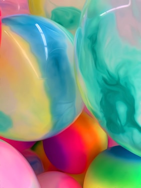 Abstract colorful spheres representing creativity and diverse ideas in a modern design.