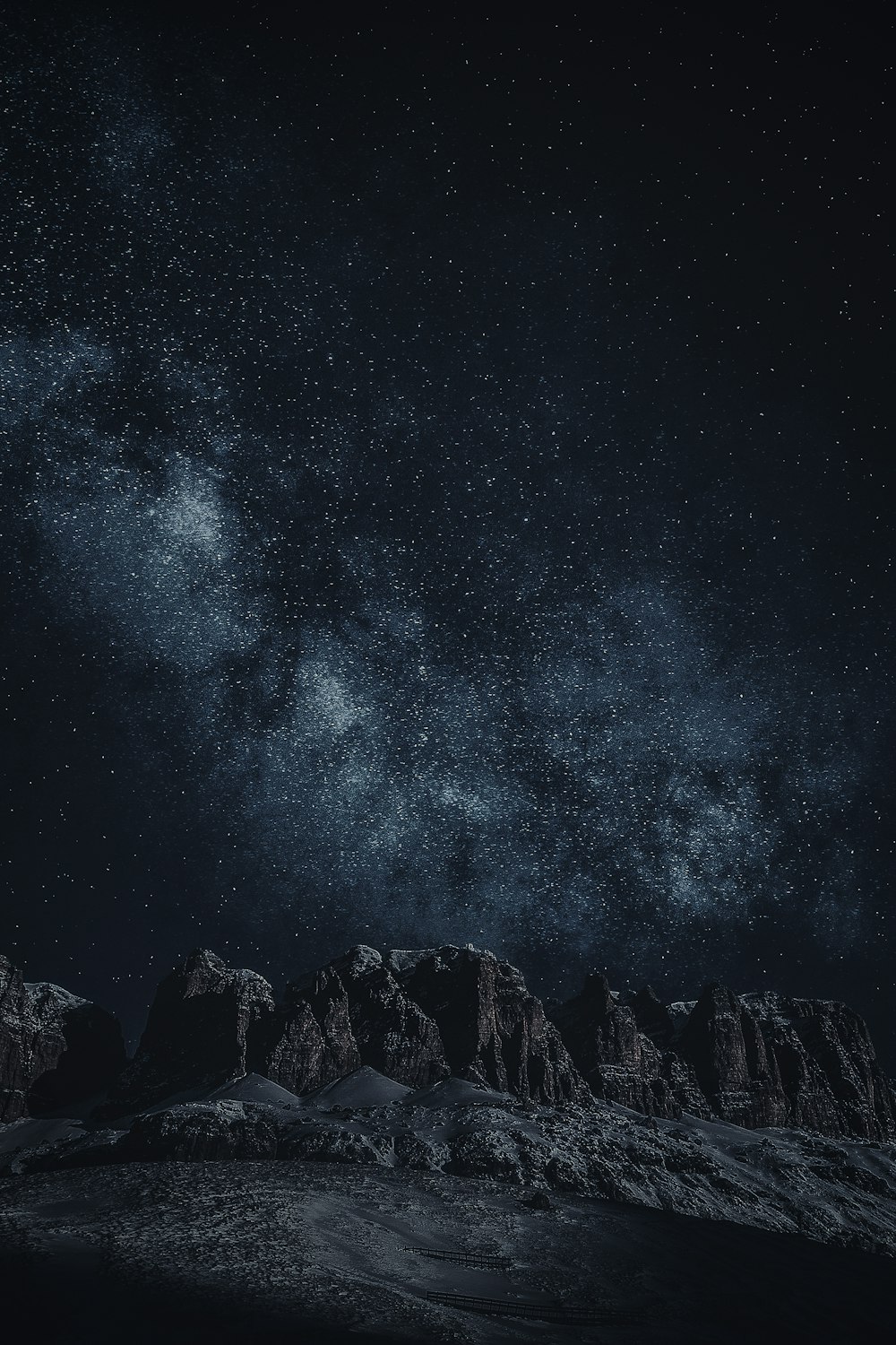 black rock formation during night time