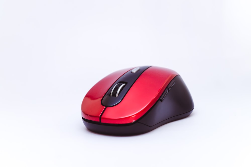 black and red cordless computer mouse