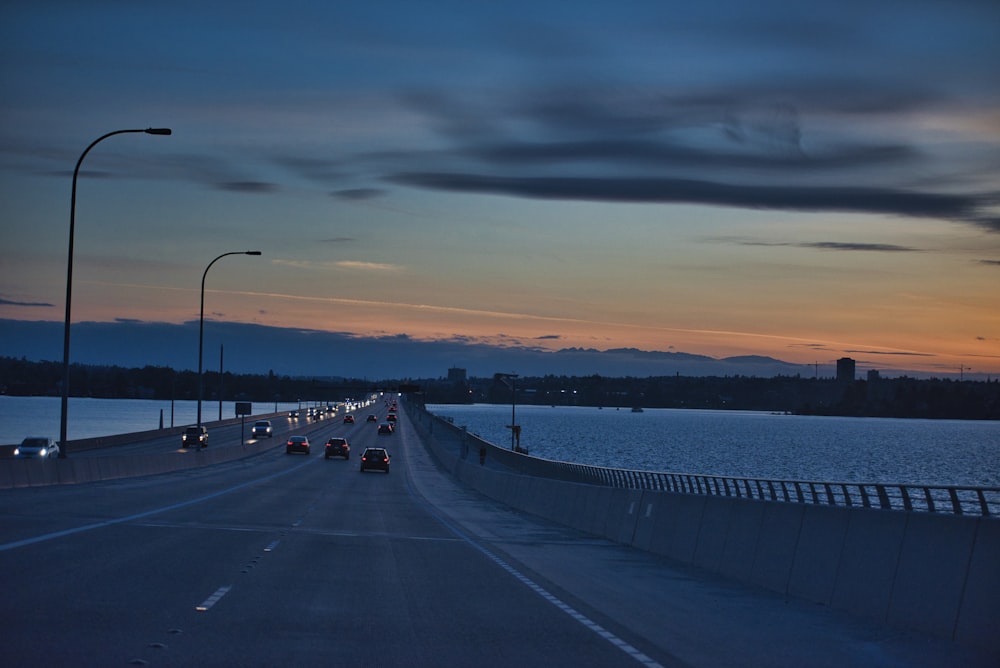 vehicle in bridge during golden hour