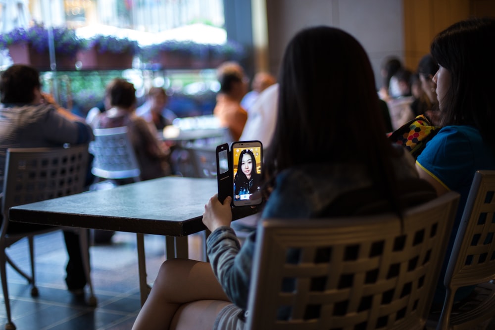 woman taking selfie