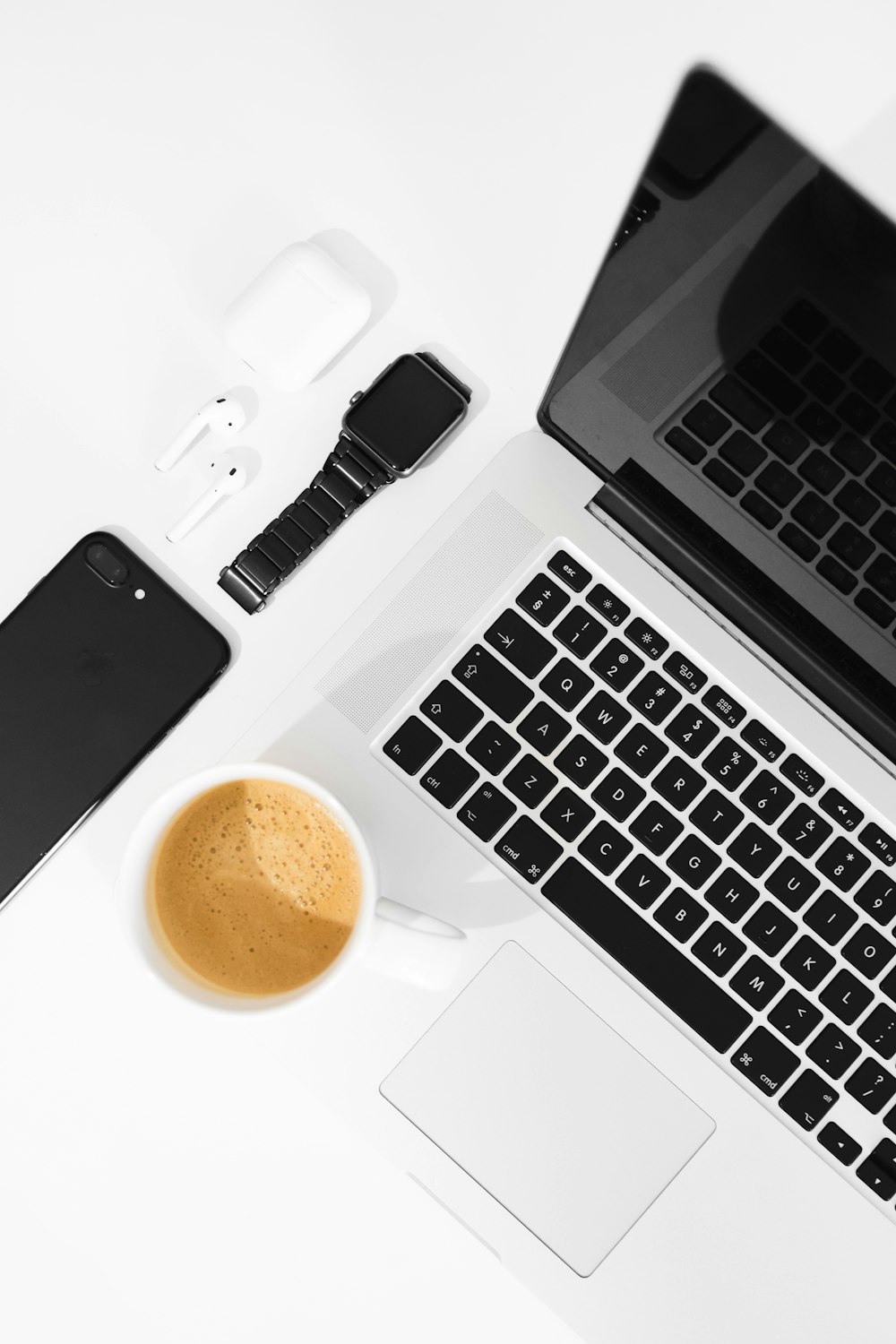 flat lay photo of MacBook