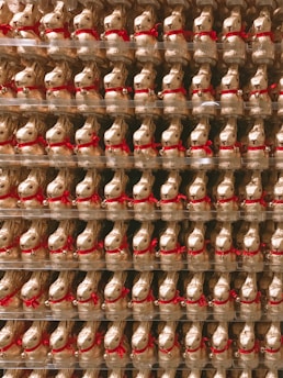 Beautifully wrapped Easter chocolate bunnies on a festive background