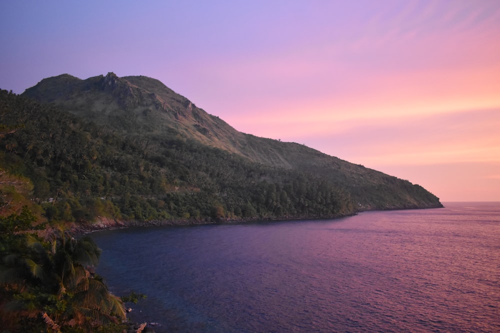 body of water and hill