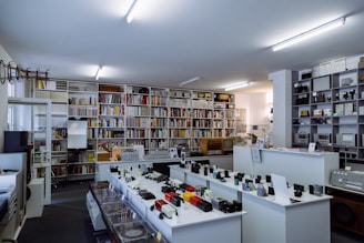 assorted-product displays on white shelf