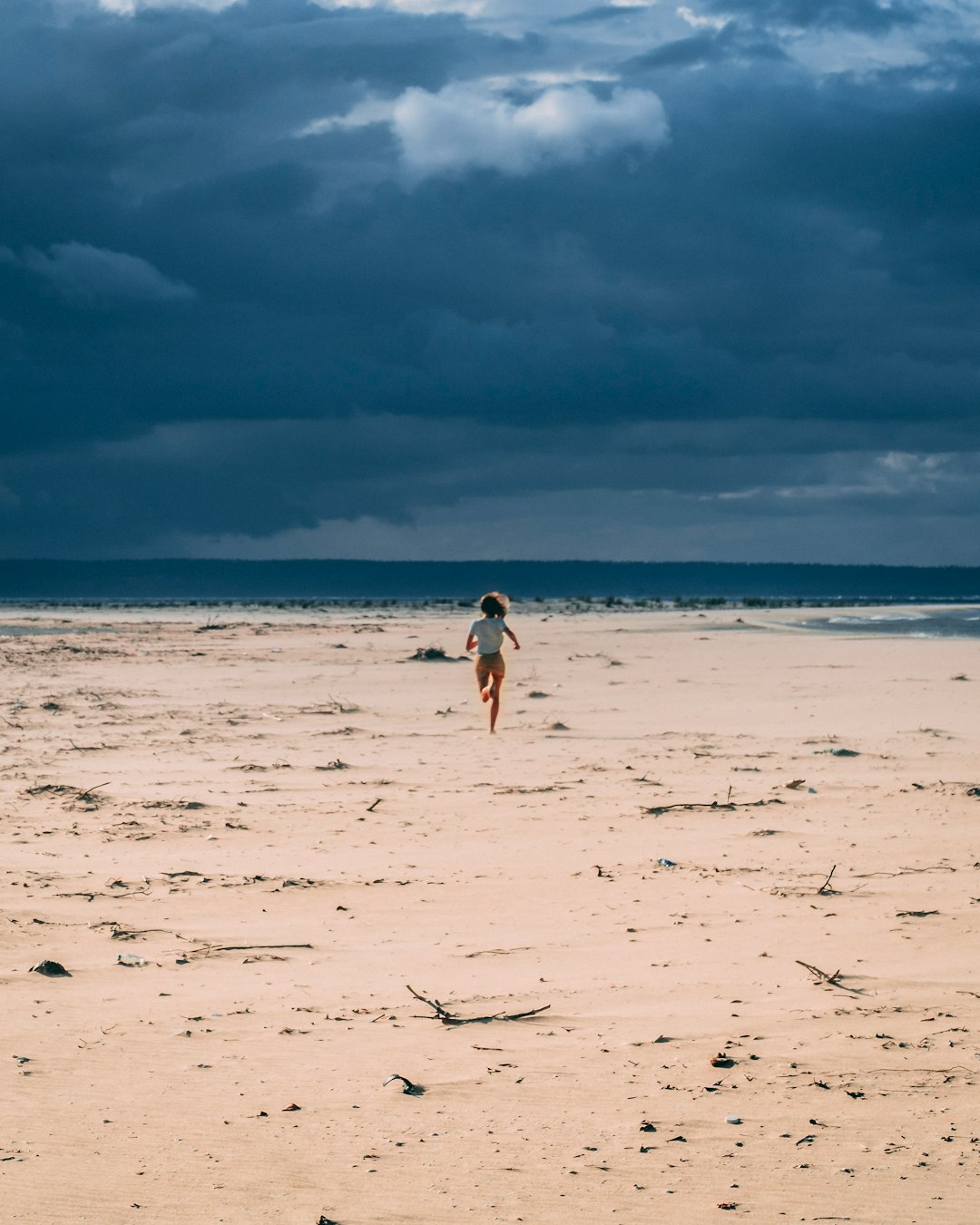 woman running in sand