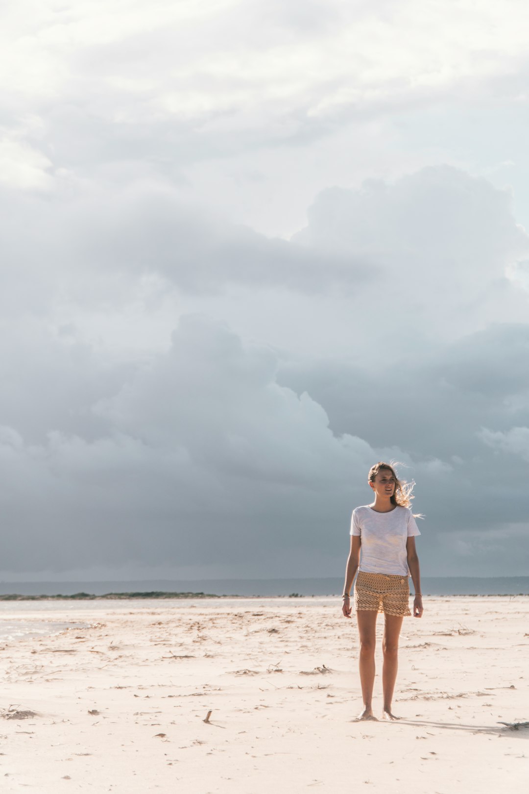 woman standing on seashore