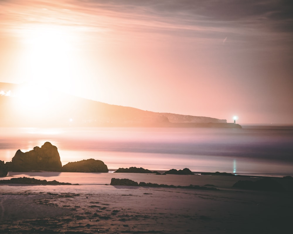 lighthouse near body of water