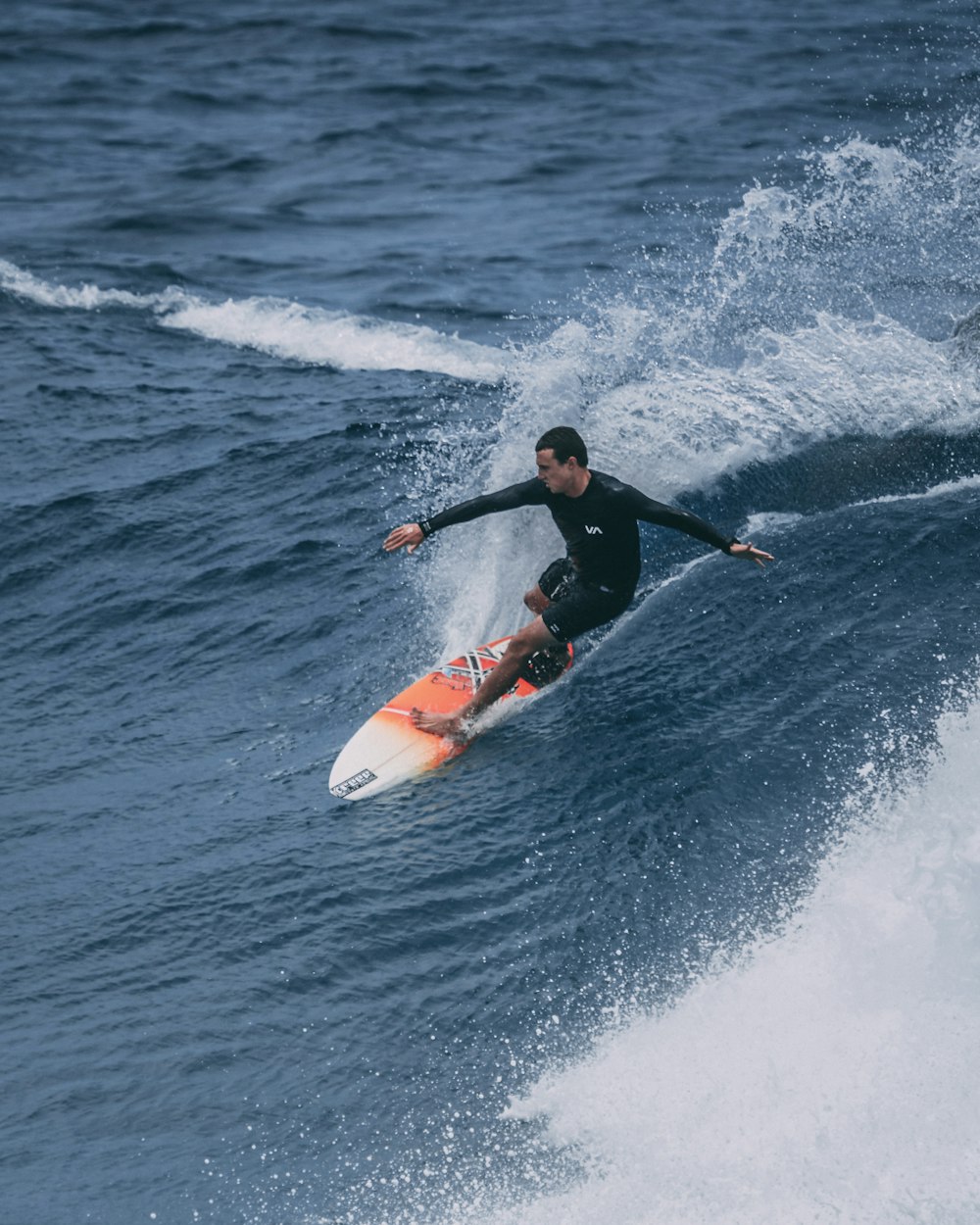 man surfing on sea waves