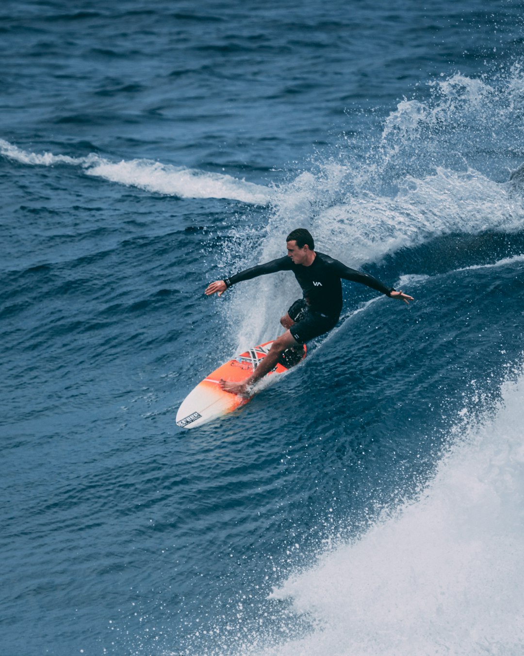 man surfing on sea waves