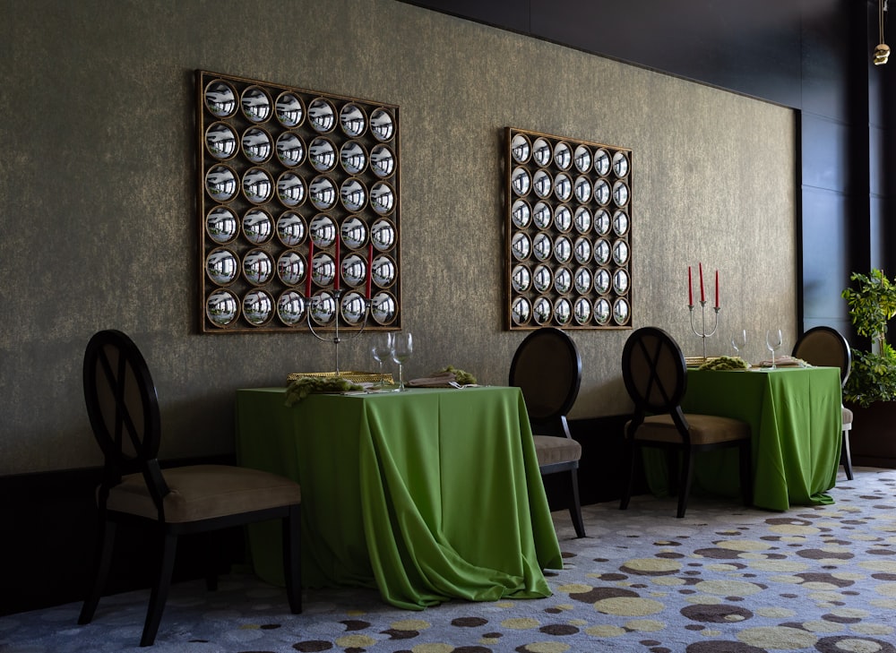 two green covered dining table set