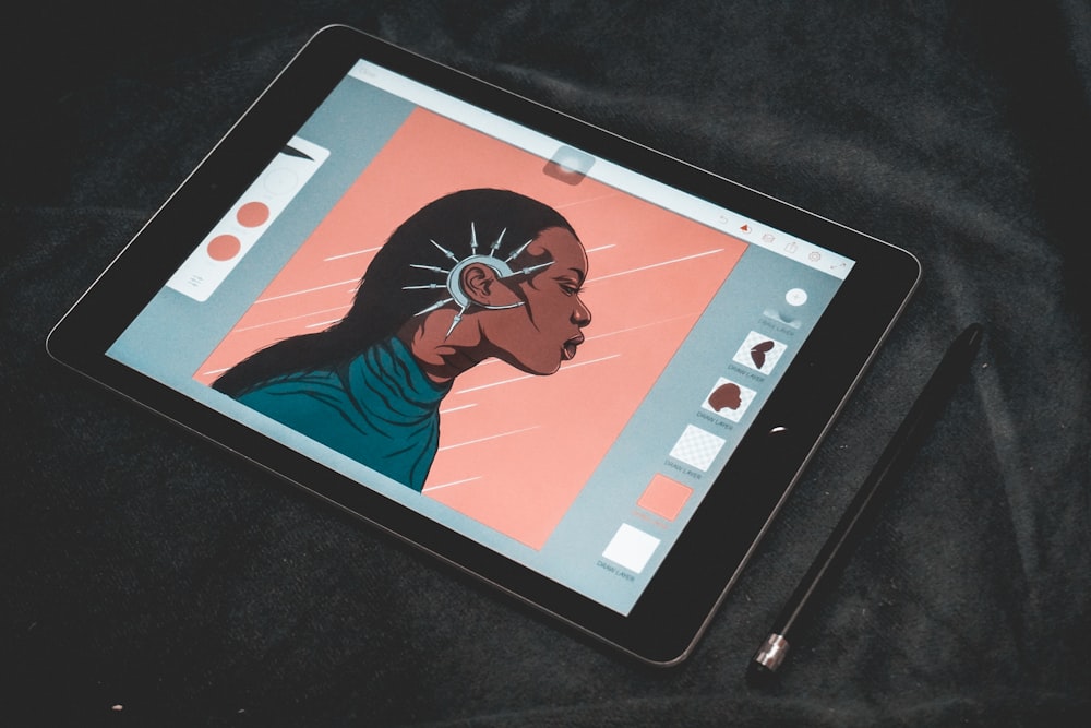 space gray iPad displaying illustration of woman