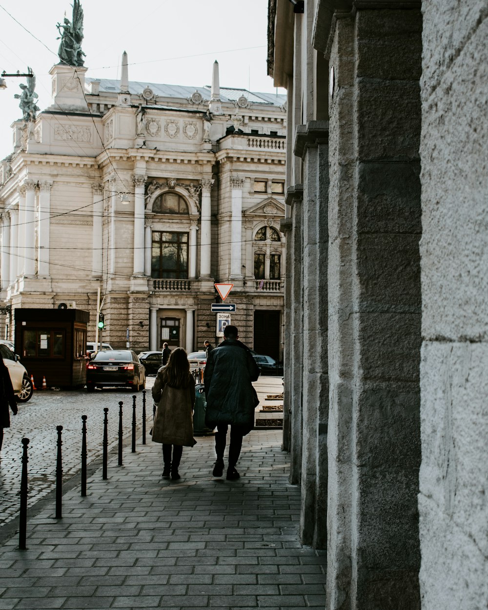 man walking on street during daytime