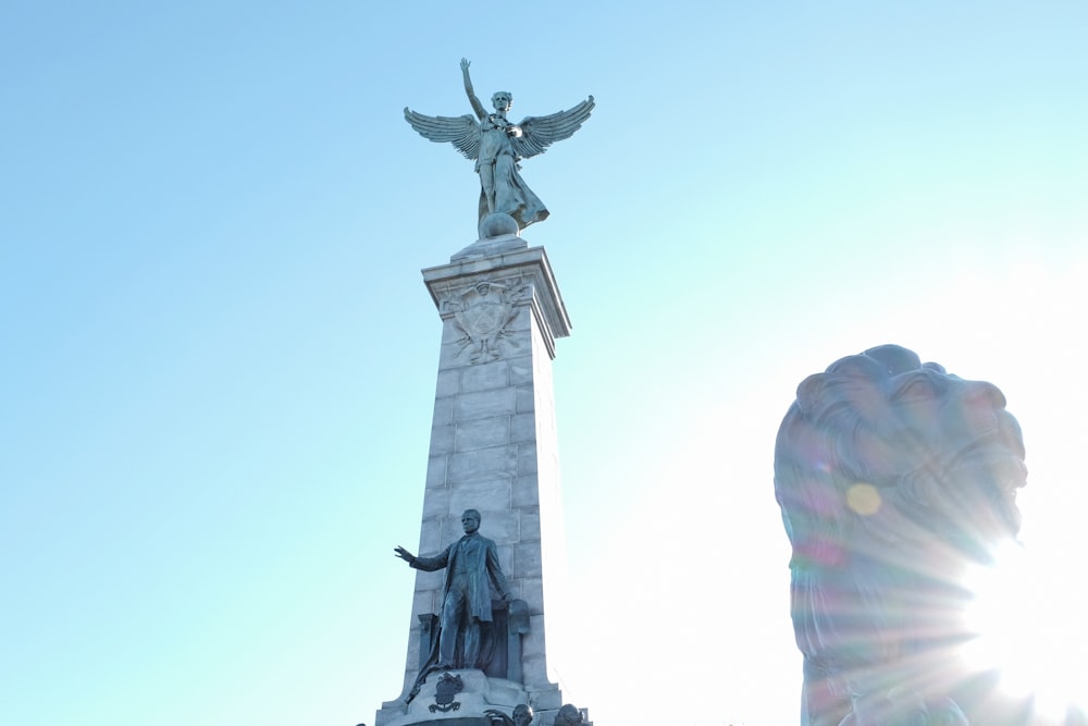 low-angle photograph of statue