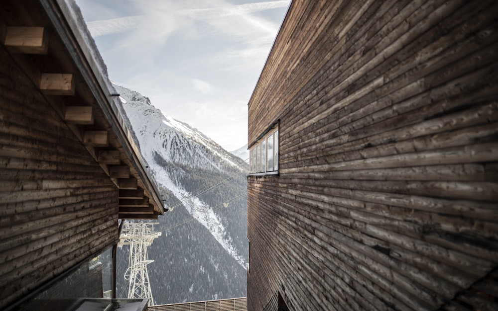 a view of a snowy mountain from a building