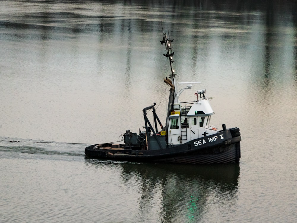 aerial photography of boat on body of water