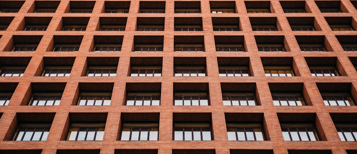 brown concrete building at daytime