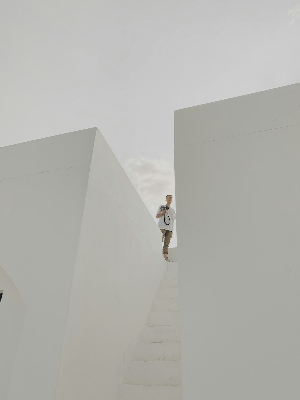 person standing on rooftop