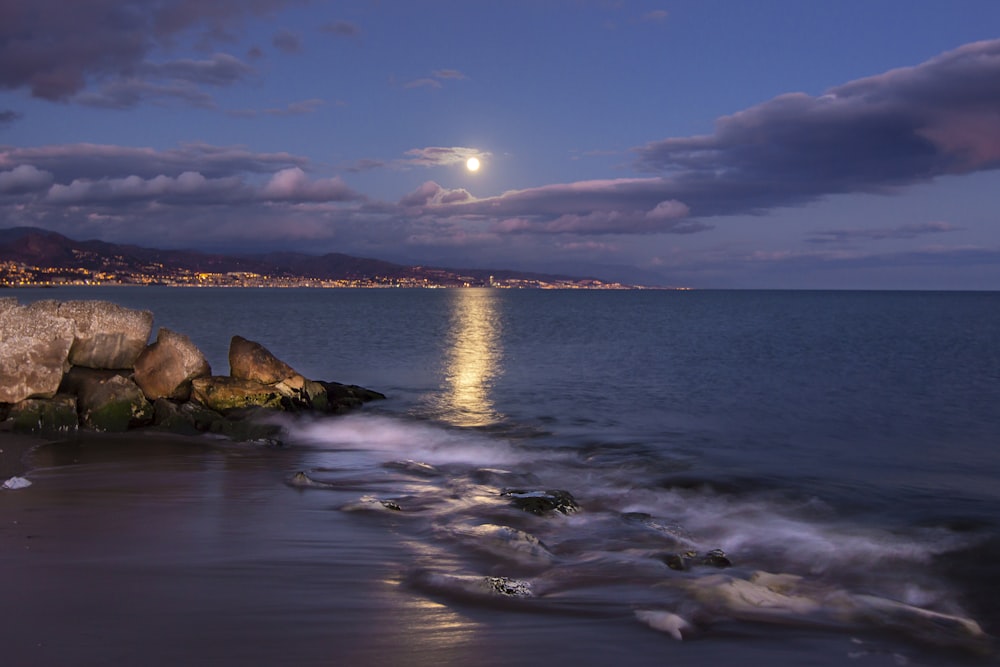 view of moon over the sea