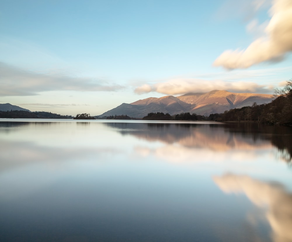 body of water beside mounatin