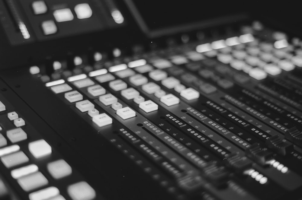 selective focus photography of audio mixer