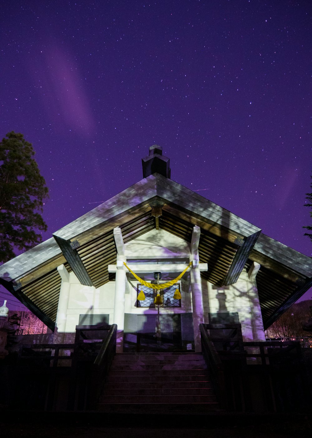 white wooden house at night