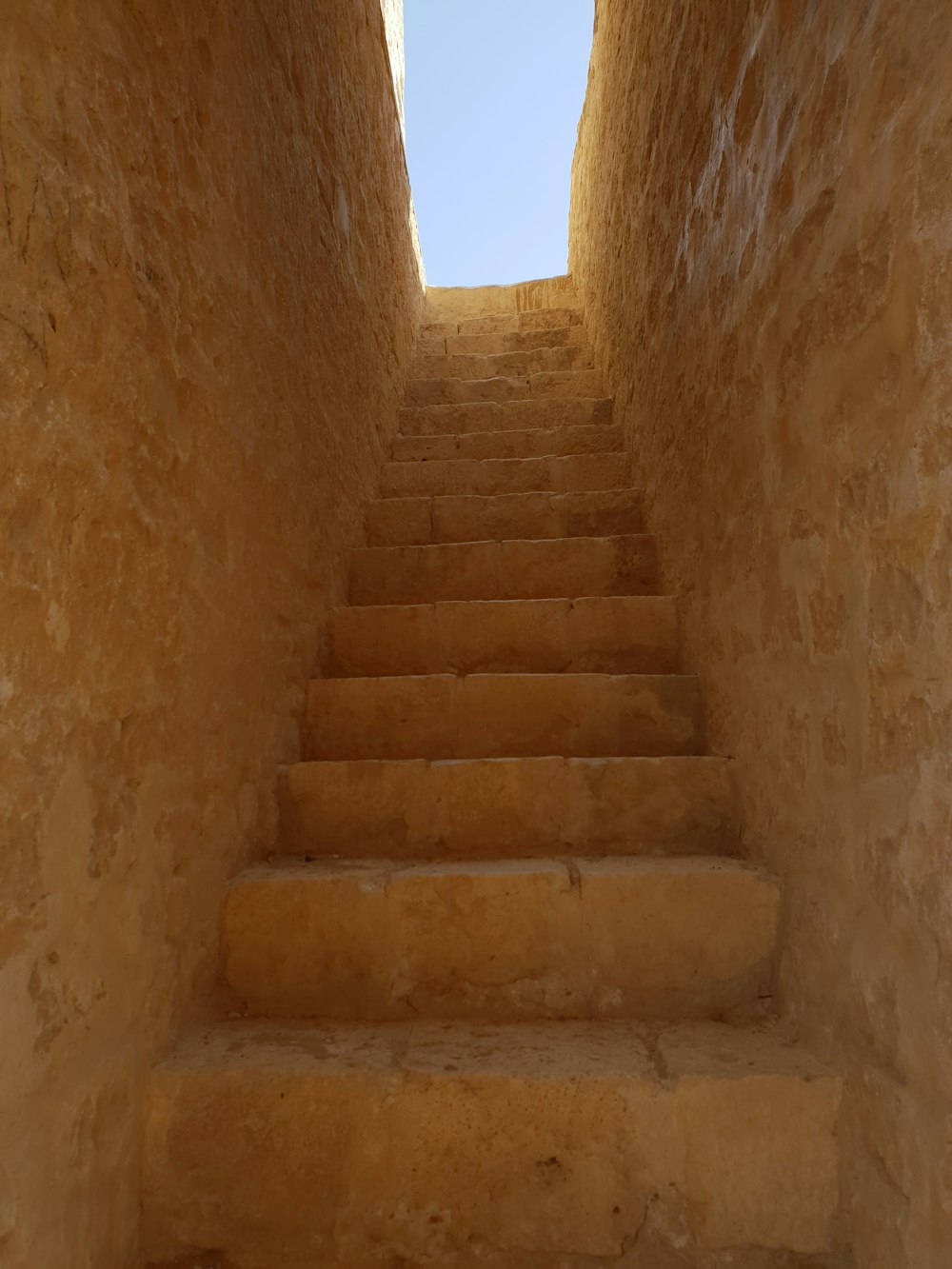 brown concrete stairs during daytime