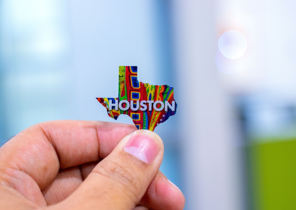 person holding Houston map decor
