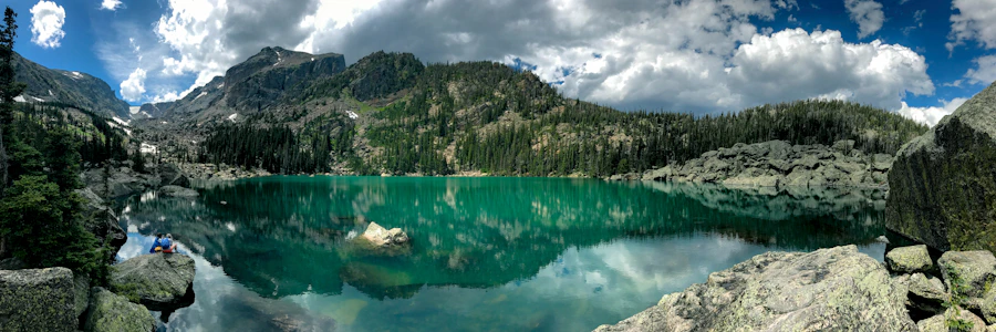 Banff National Park mountain and lake landscape under pale grey-blue sky