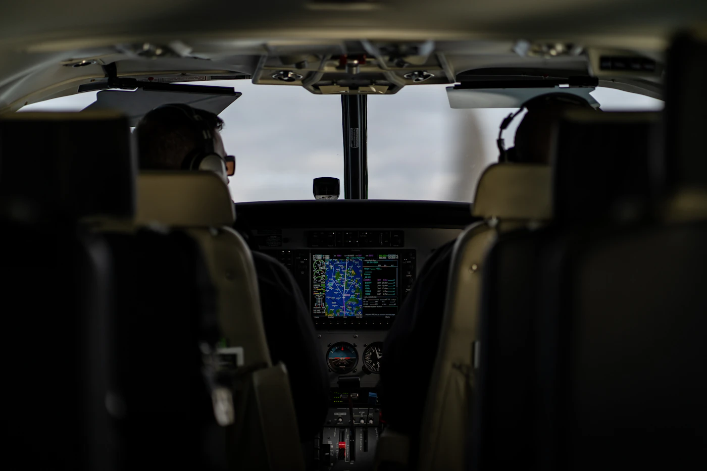 Airplane cockpit instrument panel, representing precision and flight-critical standards