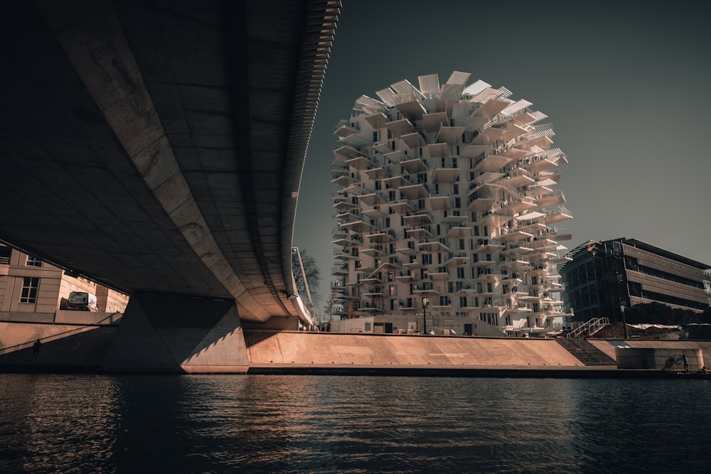 long bridge near high-rise building