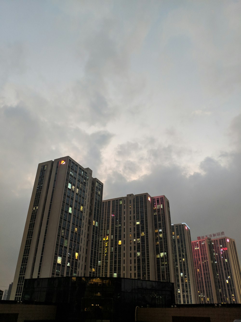 high rise building under gray sky