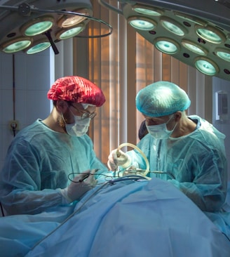 two men wearing blue lab coats