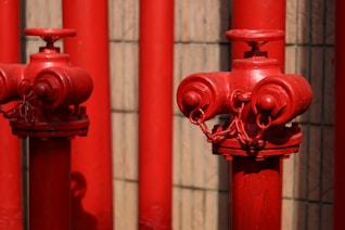 two red fire hydrants
