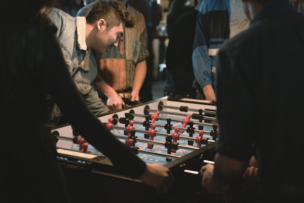 a group of people playing a game of foo foo