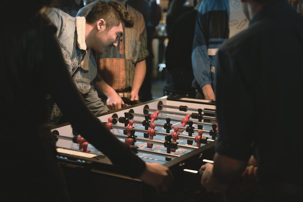 a group of people playing a game of foo foo