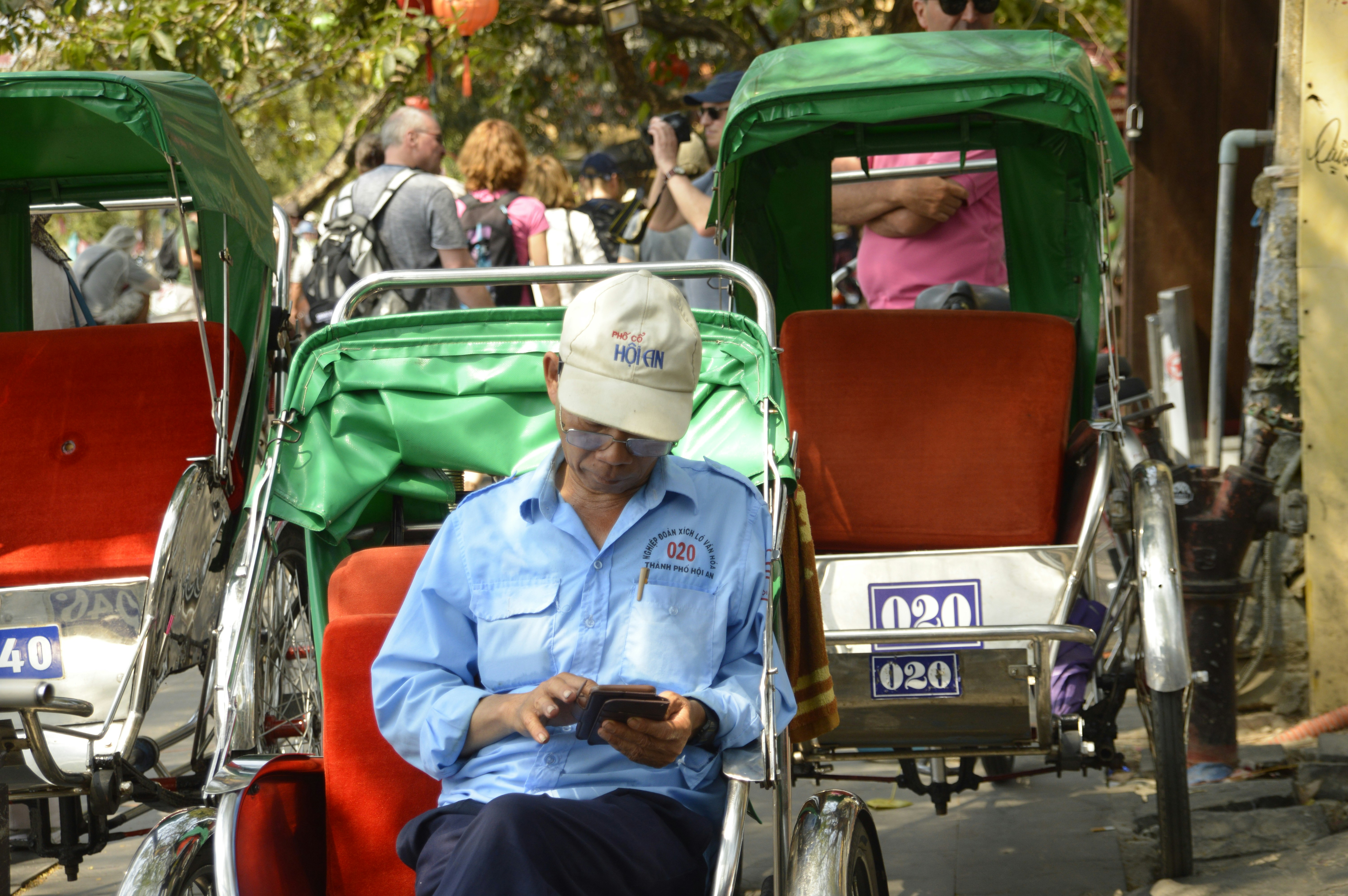 Man sitting on trike during daytime photo – Free Human Image on Unsplash