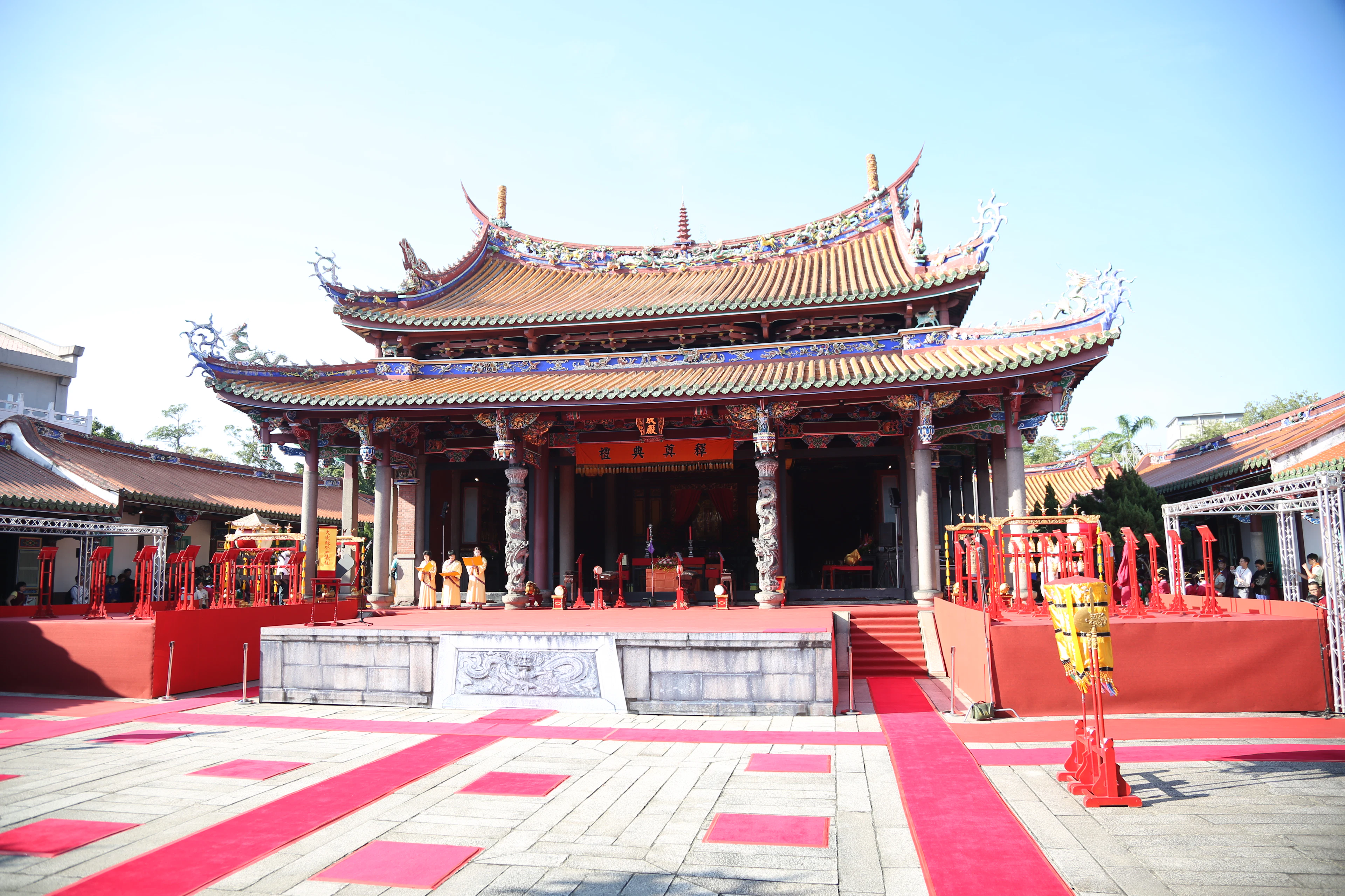 Red and beige temple with layered roof details