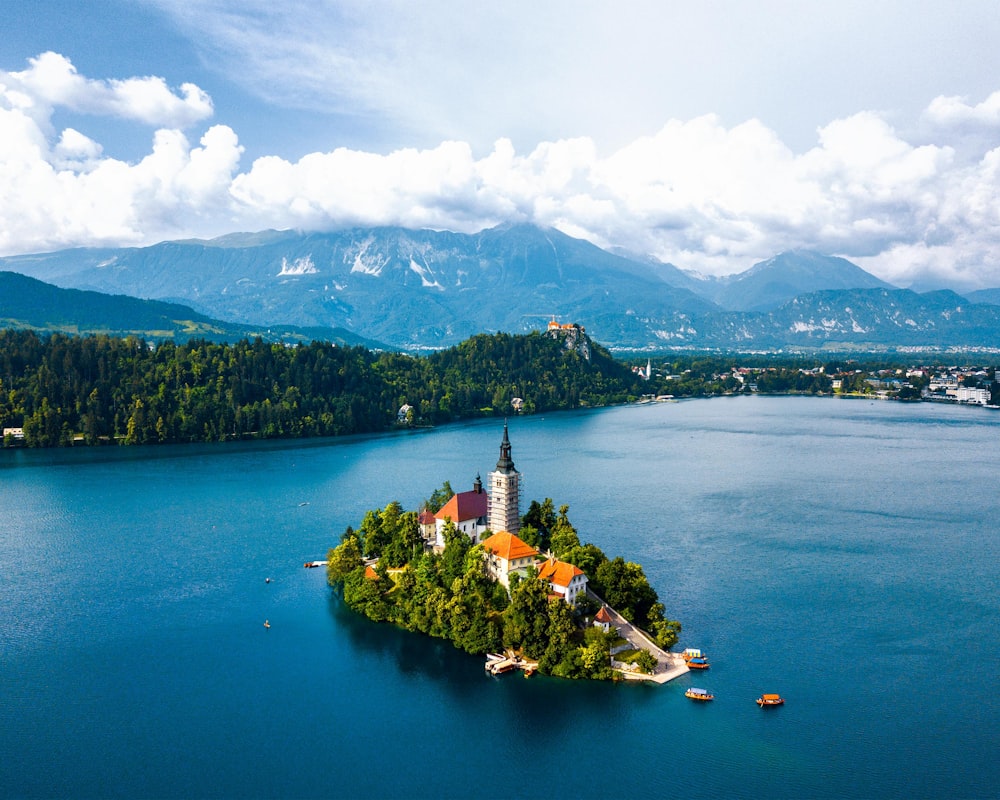 high-angle photography of castle on island