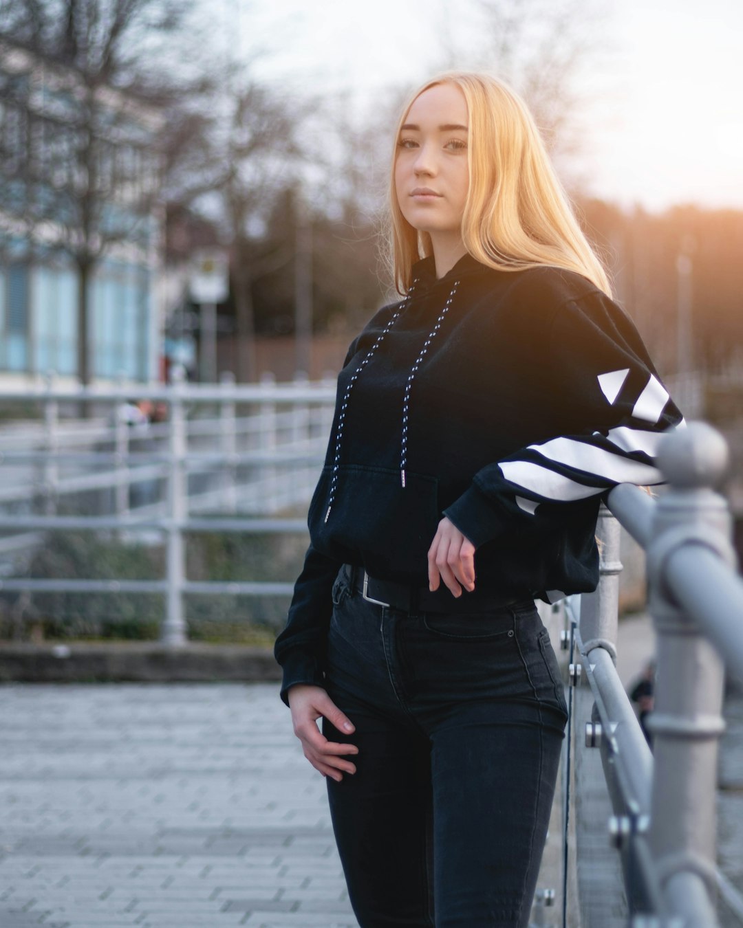 woman leaning her shoulder on railing