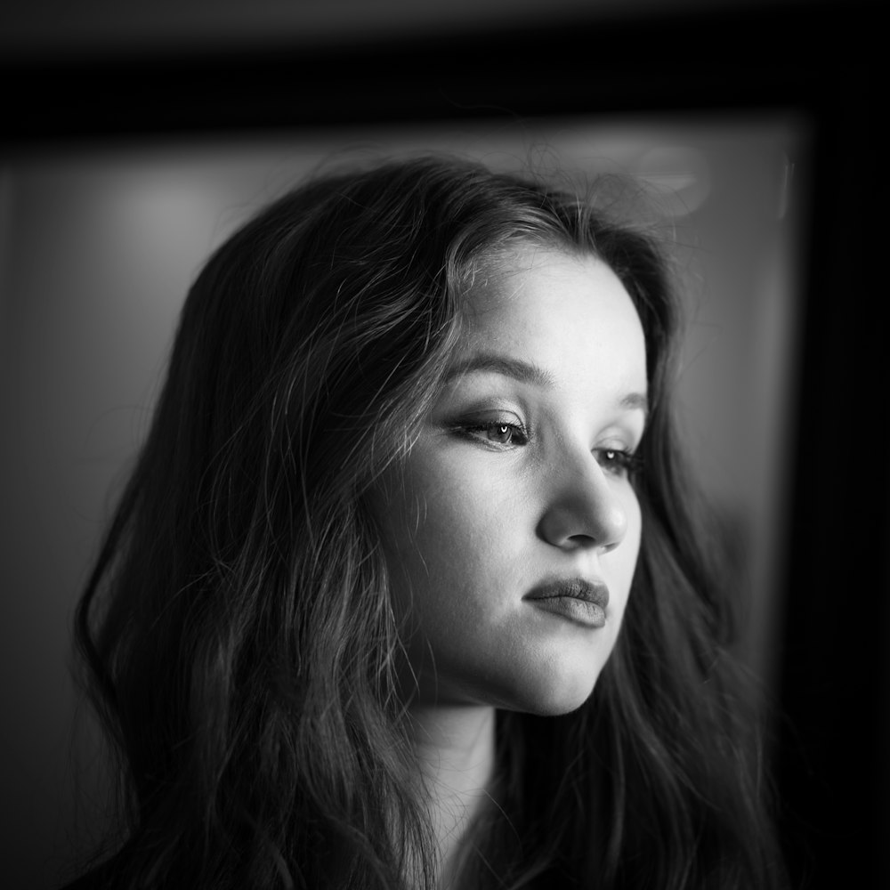 black and white photography of woman's profile