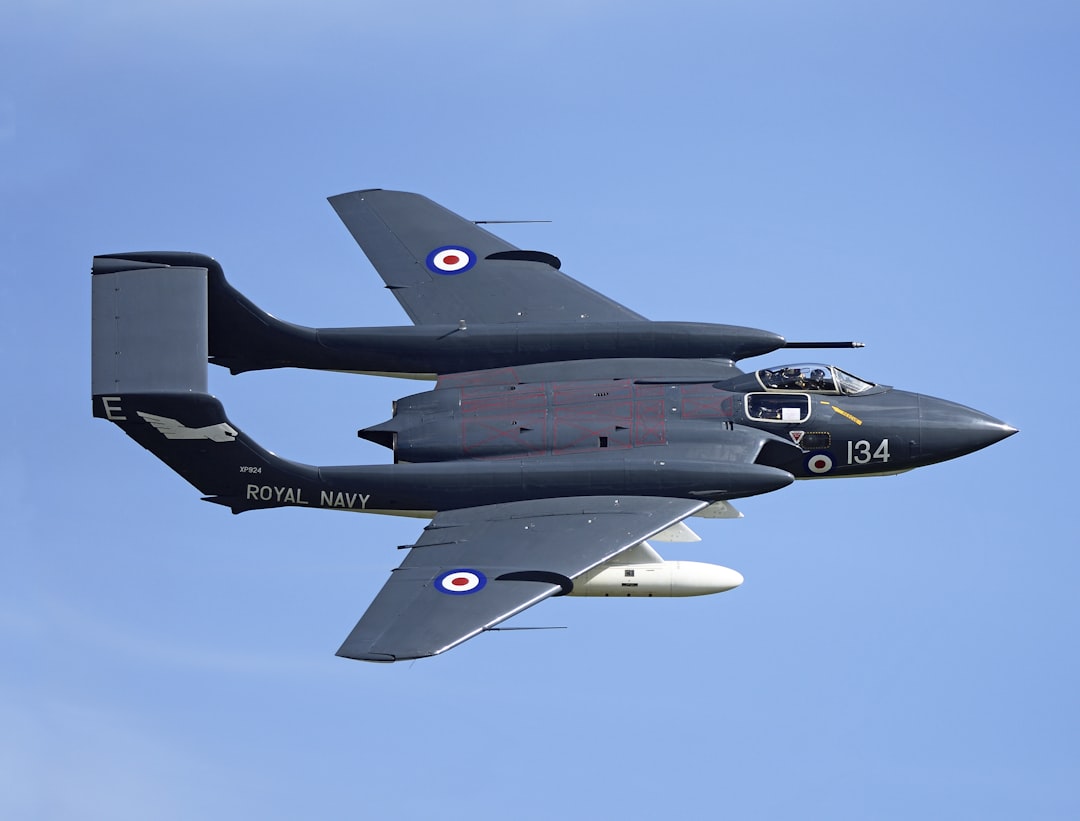 blue and gray Royal Navy aircraft, A de Havilland Sea Vixen, Royal Navy carrier aircraft of the 1960s/1970s.<p></figure>This was the last flying example.</p><p>At Duxford May Air display 2017, I had waited years to get this aircraft in perfect conditions.</p><p>Resulting photos. were outstanding. (A Ground to Air Photo.)</p><p>BUT…</p><p>Sad to say this proved to be its last flight!</p><p>It had to land “Wheels up” on return to its base RNAS Yeovilton .</p><p>Damaged beyond economical repair.