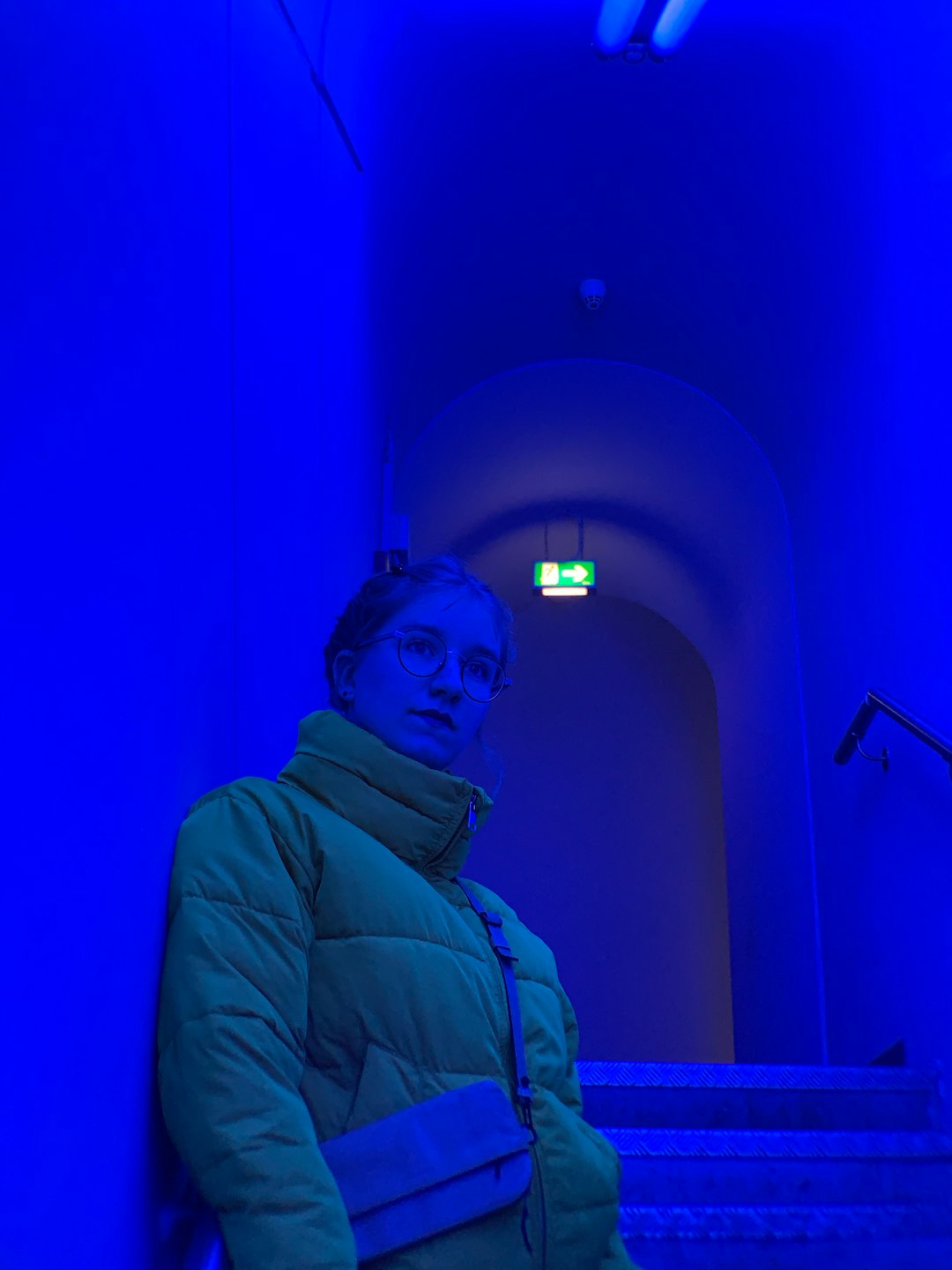 woman standing on stairs