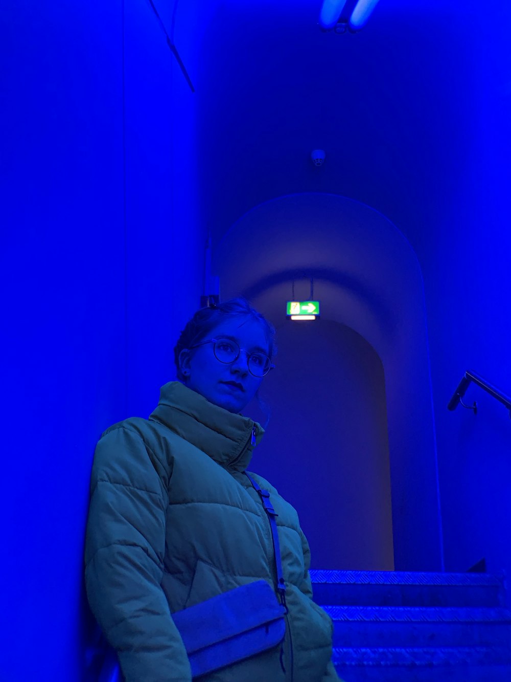 woman standing on stairs