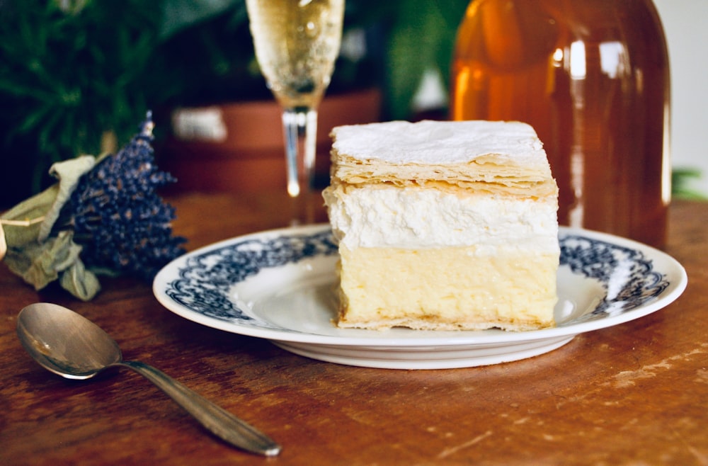 baked cake on white and blue ceramic plate