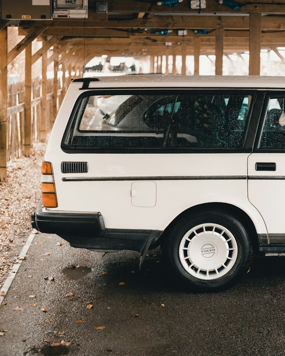 white station wagon parked during daytime