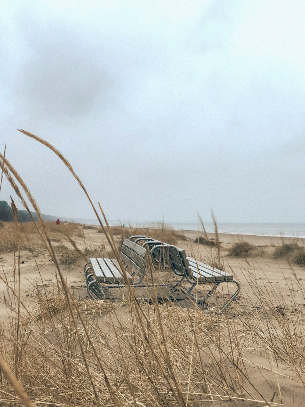 brown and gray bench near grass field