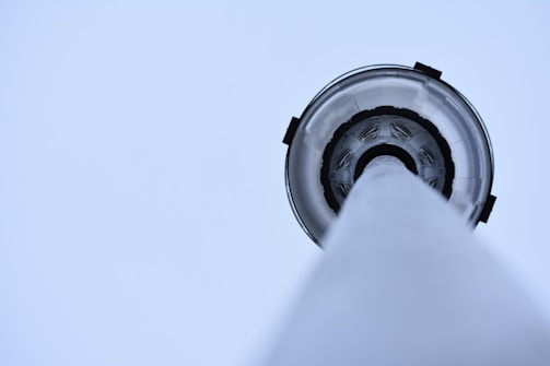 Close-up of a professionally installed lightning rod on a building.